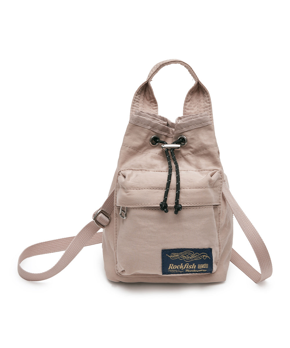 กระเป๋าสะพายข้าง NYLON DRAWSTRING MINI BAG - PINK BEIGE